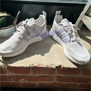 Purple and gray adidas women’s tennis shoes